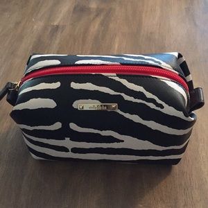 Stella Dot zebra pouf make up bag.